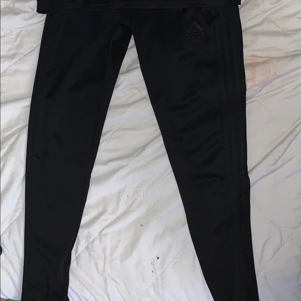 All black Adidas sweatpants